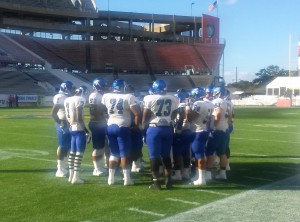 The Trinity Christian Conquerors will huddle up for the first game up in Georgia to start the 2014 season. Photo by Joshua Wilson