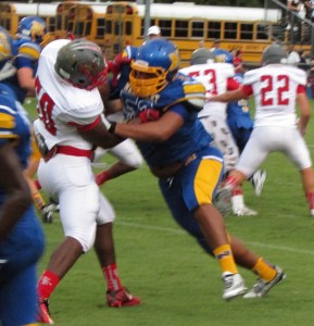 Cory Durden on the right in blue & gold for Newberry.