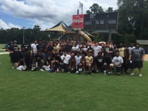 The Oakleaf Knights have been spending time at summer camps to prepare for the upcoming season (Photo Credit: Oakleaf Football)