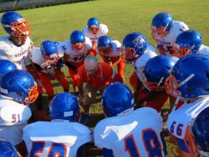 Vernon will soon be huddling up again to defend its district championship this season. (Photo Credit: Vernon High Athletics)