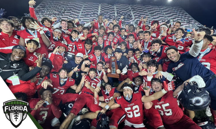 The Columbus Explorers hold poses with the Class 4M State Championship trophy after defeating Apopka 16-13 in overtime on Saturday, December 17, 2022 at DRV PNK Stadium in Fort Lauderdale, Fla. [Joshua Wilson/FloridaHSFootball.com]