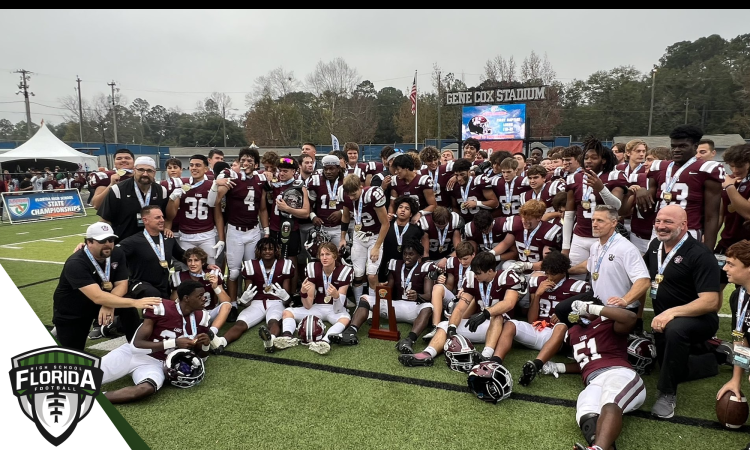 First Baptist (Naples) posses with the 2022 FHSAA Class 1S State Championship trophy after defeating Trinity Catholic (Ocala) 21-3 on Saturday, December 10, 2022 at Gene Cox Stadium in Tallahassee, Fla. [Joshua Wilson/FloridaHSFootball.com]