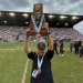 Bill Castle holds up the 2022 Class 4S State Championship after Lakeland defeated Venice 21-14 on Saturday, December 17, 2022 at DRV PNK Stadium in Fort Lauderdale, Fla. Castle announced his retirement on Tuesday, January 3, 2023 after 52 years total at Lakeland including the last 47 as head coach.