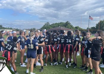 Alonso and Robinson celebrate on the field after winning the FHSAA Class 2A and Class 1A girls flag football state championships at Mandarin High School in Jacksonville, Fla. on Sat. May 13, 2023. [Photo by Robert Rahn, FloridaHSFootball.com]