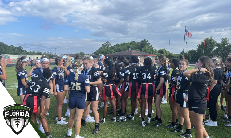 Alonso and Robinson celebrate on the field after winning the FHSAA Class 2A and Class 1A girls flag football state championships at Mandarin High School in Jacksonville, Fla. on Sat. May 13, 2023. [Photo by Robert Rahn, FloridaHSFootball.com]