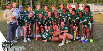 The Fleming Island Golden Eagles girls flag football team posses after coming from behind to defeat Spruce Creek in the Class 2A-Region 1 final on Mon., May 8, 2023 at Randy Warren Stadium in Fleming Island, Fla. [Joshua Wilson, FloridaHSFootball.com]