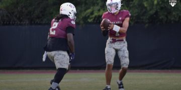 Oak Hall QB/ATH Dakota Brower looks to hand off the ball to RB Abram Jerkins on Fri. Sept. 8, 2023 as the Eagles crush Seven Rivers Christian (Lecanto) 70-14.