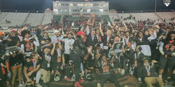 Cocoa hoists up the 2023 Class 2S State Championship after defeating Bradford (Starke) 20-6 on Fri. Dec. 8, 2023 at Ken Riley Field at Bragg Memorial Stadium in Tallahassee, Fla. [Joshua Wilson/FloridaHSFootball.com]