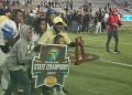 Travis Roland poses with the Class 3S State Championship trophy after the Buccaneers defeated St. Augustine 21-19 on Thu. Dec. 7, 2023 at Ken Riley Field at Bragg Memorial Stadium in Tallahassee, Fla. [Joshua Wilson/FloridaHSFootball.com]