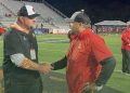 Cocoa Head Coach Ryan Schneider and Bradford (Starke) Head Coach Jamie Rodgers shake hands prior to the Class 2S State Championship game on Fri. Dec. 8, 2023 at Ken Riley Field at Bragg Memorial Stadium in Tallahassee, Fla. [Joshua Wilson/FloridaHSFootball.com]