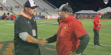 Cocoa Head Coach Ryan Schneider and Bradford (Starke) Head Coach Jamie Rodgers shake hands prior to the Class 2S State Championship game on Fri. Dec. 8, 2023 at Ken Riley Field at Bragg Memorial Stadium in Tallahassee, Fla. [Joshua Wilson/FloridaHSFootball.com]