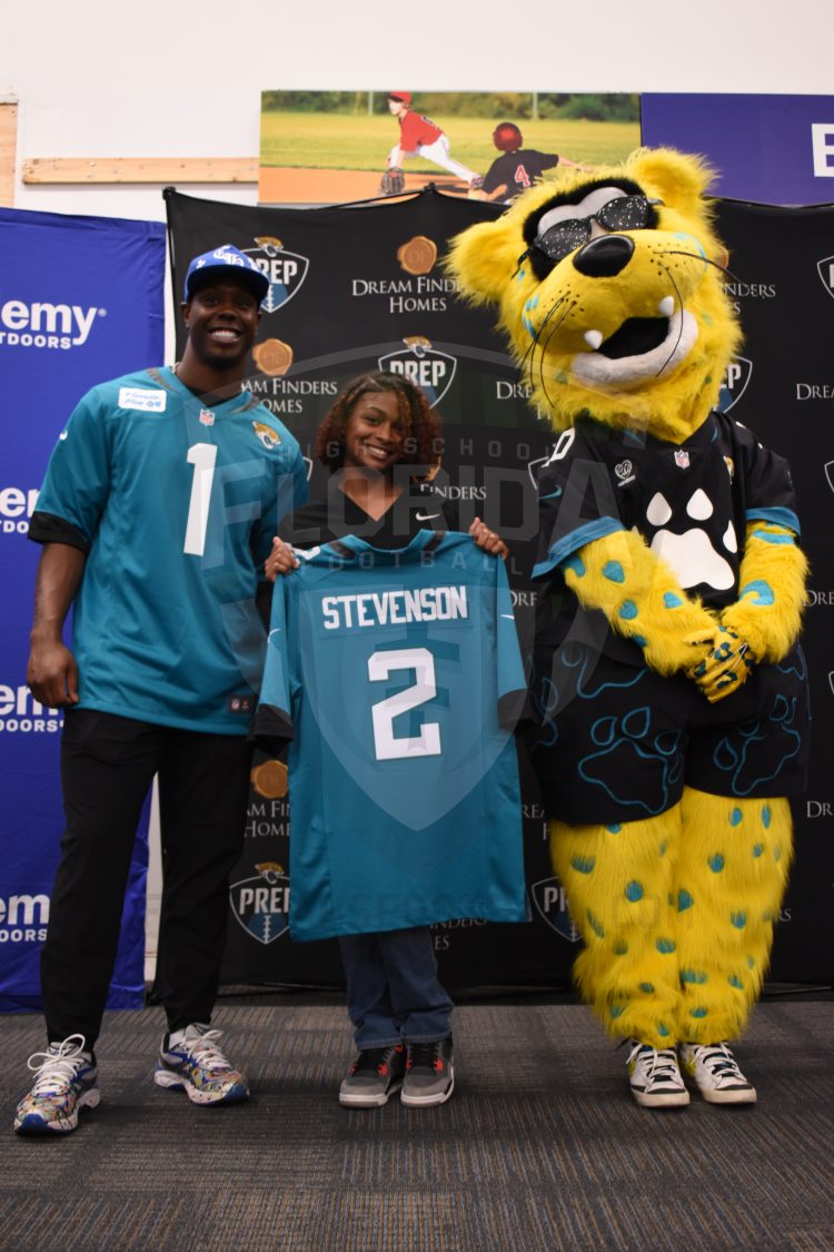 R Elyhana Perez-Stevenson, Ed White (Jacksonville) at the 2024 Jaguars All-PREP Flag Football recognition event held at Academy Sports + Outdoors on Southside Blvd. on Wed. May 8, 2024, in Jacksonville, Fla. [Joshua Wilson/FloridaHSFootball.com]