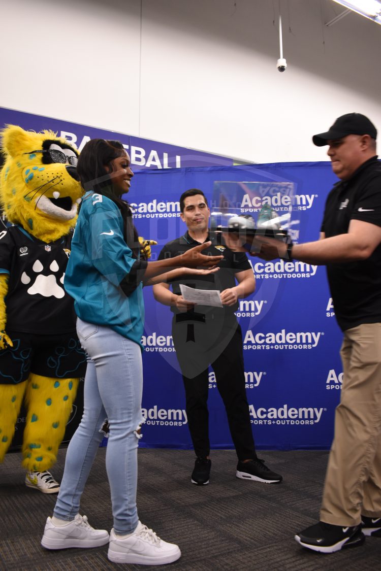 London Jenkins, Fleming Island, receives the 2024 Player of the Year Award at the 2024 Jaguars All-PREP Flag Football recognition event held at Academy Sports + Outdoors on Southside Blvd. on Wed. May 8, 2024, in Jacksonville, Fla. [Joshua Wilson/FloridaHSFootball.com]