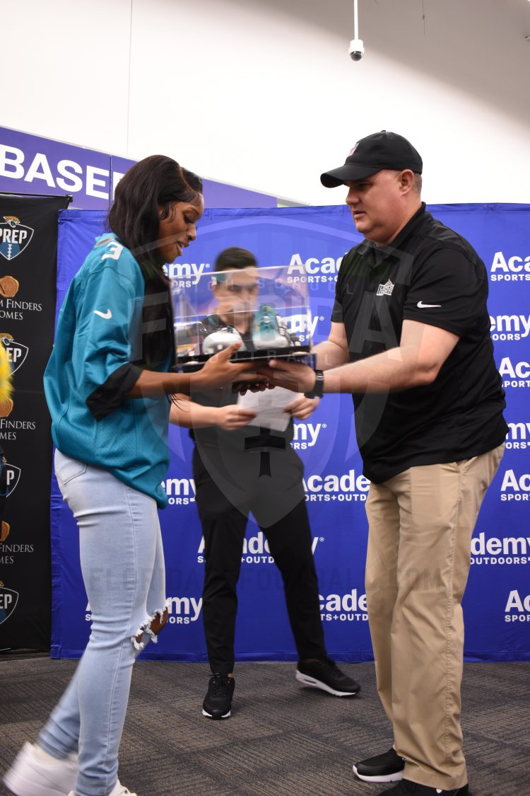 London Jenkins, Fleming Island, receives the 2024 Player of the Year Award at the 2024 Jaguars All-PREP Flag Football recognition event held at Academy Sports + Outdoors on Southside Blvd. on Wed. May 8, 2024, in Jacksonville, Fla. [Joshua Wilson/FloridaHSFootball.com]