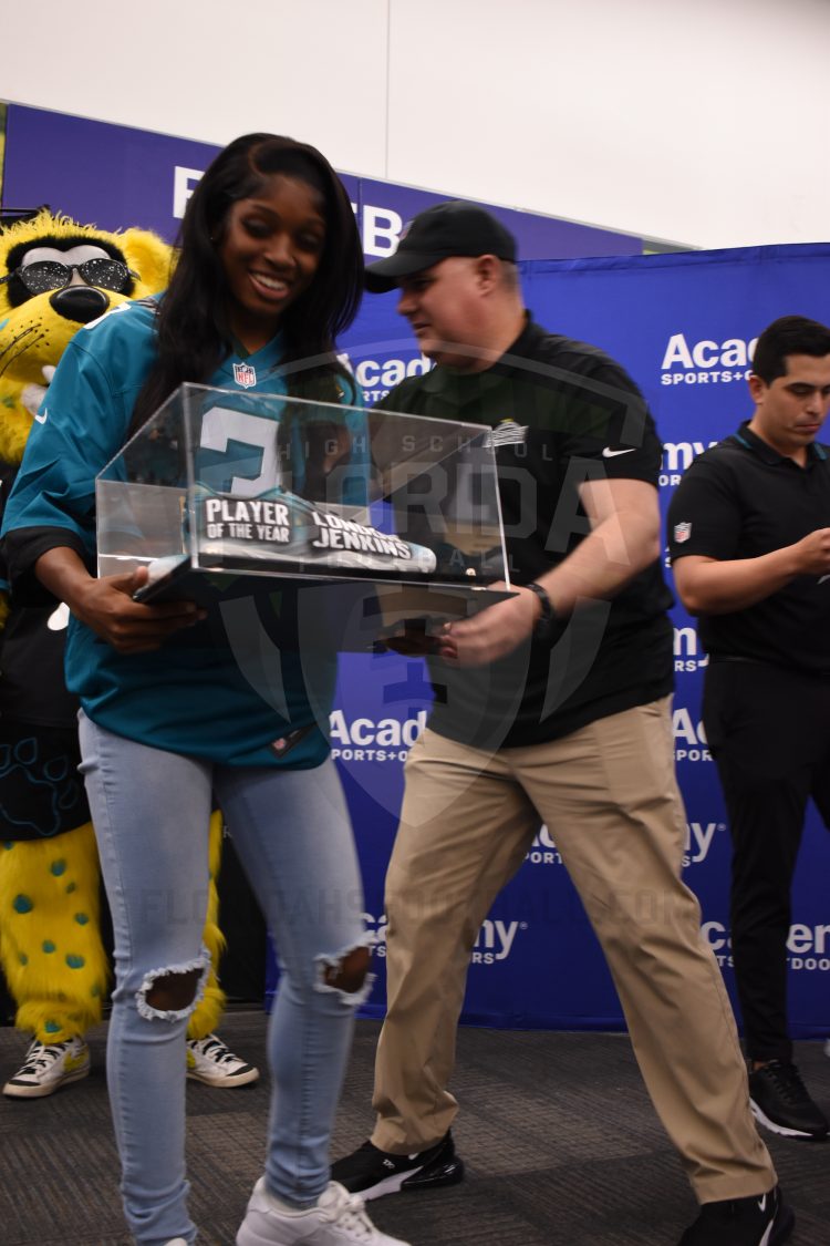 London Jenkins, Fleming Island, is all smiles after receiving the 2024 Player of the Year Award at the 2024 Jaguars All-PREP Flag Football recognition event held at Academy Sports + Outdoors on Southside Blvd. on Wed. May 8, 2024, in Jacksonville, Fla. [Joshua Wilson/FloridaHSFootball.com]