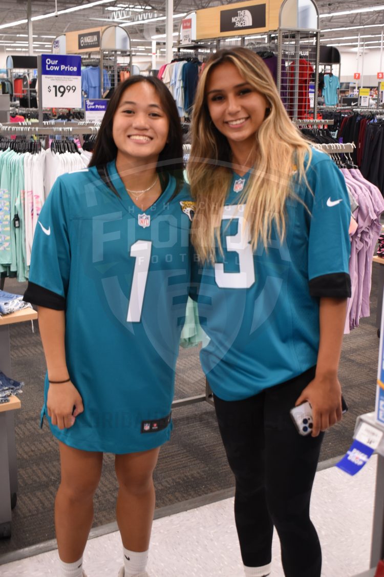 Gaby Fajardo (left) of Stanton and Gaby Rourke (right) of Atlantic Coast pose for a photo at the 2024 Jaguars All-PREP Flag Football recognition event held at Academy Sports + Outdoors on Southside Blvd. on Wed. May 8, 2024, in Jacksonville, Fla. [Joshua Wilson/FloridaHSFootball.com]