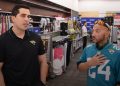 Adriel Rocha, Jacksonville Jaguars VP of Community Impact and Football Development talks with 2024 Coach of the Year, Bachir Saoud of Ed White (Jacksonville) during the 2024 Jaguars All-PREP Flag Football recognition event held at Academy Sports + Outdoors on Southside Blvd. on Wed. May 8, 2024, in Jacksonville, Fla. [Joshua Wilson/FloridaHSFootball.com]