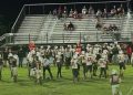 Bishop Kenny (Jacksonville) took to the field after a soggy delay and defeated Tocoi Creek (St. Augustine) on the road. [Marty Pallman/For FloridaHSFootball.com]