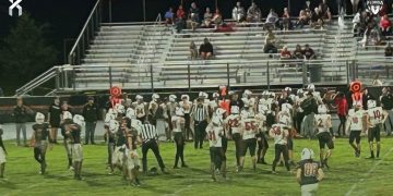 Bishop Kenny (Jacksonville) took to the field after a soggy delay and defeated Tocoi Creek (St. Augustine) on the road. [Marty Pallman/For FloridaHSFootball.com]