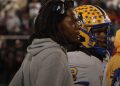 Miami Northwestern Head Coach Teddy Bridgewater and QB Leon Strawder huddle up the rest of the Bulls offense during a time out during the recent 2024 FHSAA Class 3A State Championship. Strawder was among three athletes that stood out in the 2024 FHSAA Class 3A State Championship Game on Sat. Dec. 14, 2024, at South Dade Kia Field at Pitbull Stadium in Miami [Joshua Wilson/FloridaHSFootball.com]