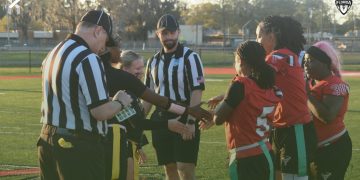 Columbia (Lake City) and Bradford (Starke) meet at midfield for the coin toss prior to their game on Tue. Feb. 25, 2025 at David Hurse Stadium in Starke, Fla. [Joshua Wilson/FloridaHSFootball.com]