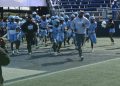 Gadsden County runs out on to the field at Pitbull Stadium in Miami, Fla. prior to the 2024 FHSAA Class 2A State Championship Game. [Joshua Wilson/FloridaHSFootball.com]