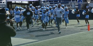 Gadsden County runs out on to the field at Pitbull Stadium in Miami, Fla. prior to the 2024 FHSAA Class 2A State Championship Game. [Joshua Wilson/FloridaHSFootball.com]