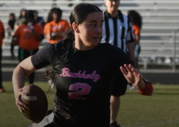 Buchholz (Gainesville) QB Isabella Alexander runs with the ball during their game against Eastside (Gainesville) on Friday, March 6, 2026. [Joshua Wilson/FloridaHSFootball.com]